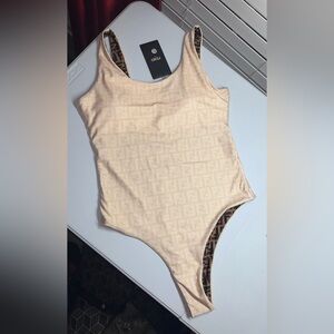 One Piece Swimsuit. No Brand.
